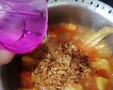 A picture of step 2 of Alo chicken curry.