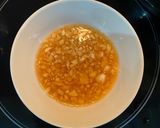 Hình bước làm 3 của món Nộm tai heo cổ hũ dừa
