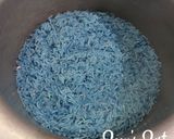 A picture of step 2 of Blue Ghee Rice with Pine nuts.