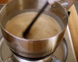 A picture of step 6 of Easy! Caramel Banana Milk Pudding.