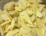 A picture of step 1 of Rosemary garlic potato wedges with salad.