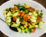 A picture of step 2 of Cucumber salsa🥒🍅🍋.