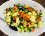 A picture of step 2 of Cucumber salsa🥒🍅🍋.