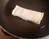 A picture of step 6 of Paneer chicken bread roll.