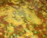 A picture of step 13 of Alu matar gravy.