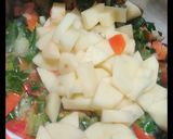 A picture of step 2 of Masaledaar Green onion with potatoes.