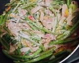 A picture of step 4 of Fried Green Beans with Ham & Radish Greens.