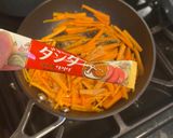 A picture of step 2 of Korean carrot Namul.