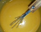 A picture of step 4 of Mango flavour cake.