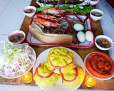 Hình bước làm 5 của món Mâm cúng Ông Địa Thần Tài có món tôm càng xanh luộc