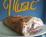A picture of step 17 of Marbled Swiss Roll Filled with Cream and Strawberries with Chocolate.