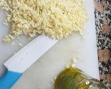 Foto del paso 3 de la receta: Ajos en aceite y albahaca