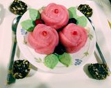 A picture of step 6 of Sooji roses with chocolate leaves.