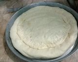 A picture of step 5 of Chicken & cheese Naan.