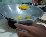 A picture of step 2 of Jasuke (Sweet Corn with milk and cheese/chocolate).