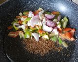 A picture of step 3 of Red Rice with Corn.