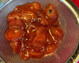 A picture of step 3 of Strawberry simple syrup.