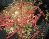 Foto del paso 1 de la receta: Arroz negro de calamares y langostinos