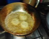 A picture of step 3 of Laddu pithi with chutney.