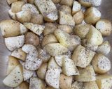 A picture of step 2 of Greek burgers with potatoes.