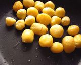 A picture of step 5 of Dum Aloo.
