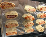 Foto del paso 4 de la receta: Rollitos de jamón y queso al horno