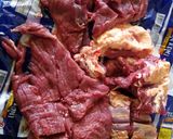 A picture of step 1 of Nyama choma (beef).