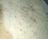 A picture of step 3 of Alu paratha with desi ghee.