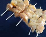 A picture of step 4 of Tawa chicken sticks.