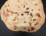 A picture of step 7 of Shahi paneer with paratha.