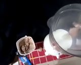 A picture of step 3 of Oreo ice cream milkshake.
