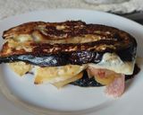 Foto del paso 9 de la receta: Sándwich de berenjena🍆con pera y queso🧀🍯🧅🍐