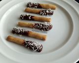 A picture of step 8 of Chocolate covered Cookie sticks.