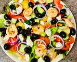 A picture of step 5 of Greek salad with shrimps.