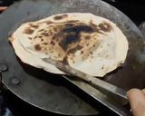 A picture of step 12 of Paneer Butter Masala with Tandoori Naan.
