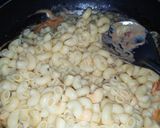 A picture of step 4 of Thousand island dressing pasta salad.