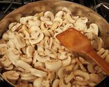 A picture of step 3 of Sausage and Mushroom Pasta in a Parmesan Cream.