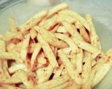 A picture of step 2 of Masala French fries.
