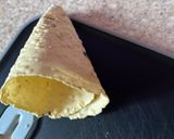 A picture of step 1 of Masala papad cone.