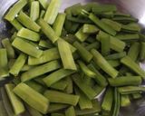A picture of step 1 of Gavar potato nutty sabji.