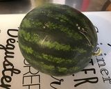 Une image de l'étape 2 de Salade de melon, pastèque et raisin au miel.