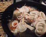 A picture of step 2 of Stir-fried squid with ginger, basil and chili 🦑.