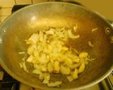 A picture of step 4 of LEHSUNI PANEER gravy.