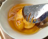 A picture of step 3 of Bu Nanik's Honey Fried Bananas.