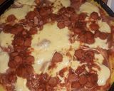 Foto del paso 3 de la receta: Polenta a la pizza con salchichas