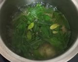 A picture of step 1 of Tulsi and Lemongrass Tea.