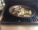 Foto del paso 2 de la receta: Arroz negro en barbacoa de gas weber o similar