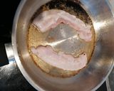 A picture of step 5 of Eggy bread and bacon fried omelette.