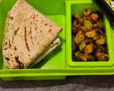 A picture of step 8 of Roti with brinjal aloo fry.