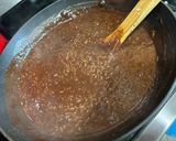 A picture of step 3 of Choco Biko with white coconut shreds and toasted coconut.